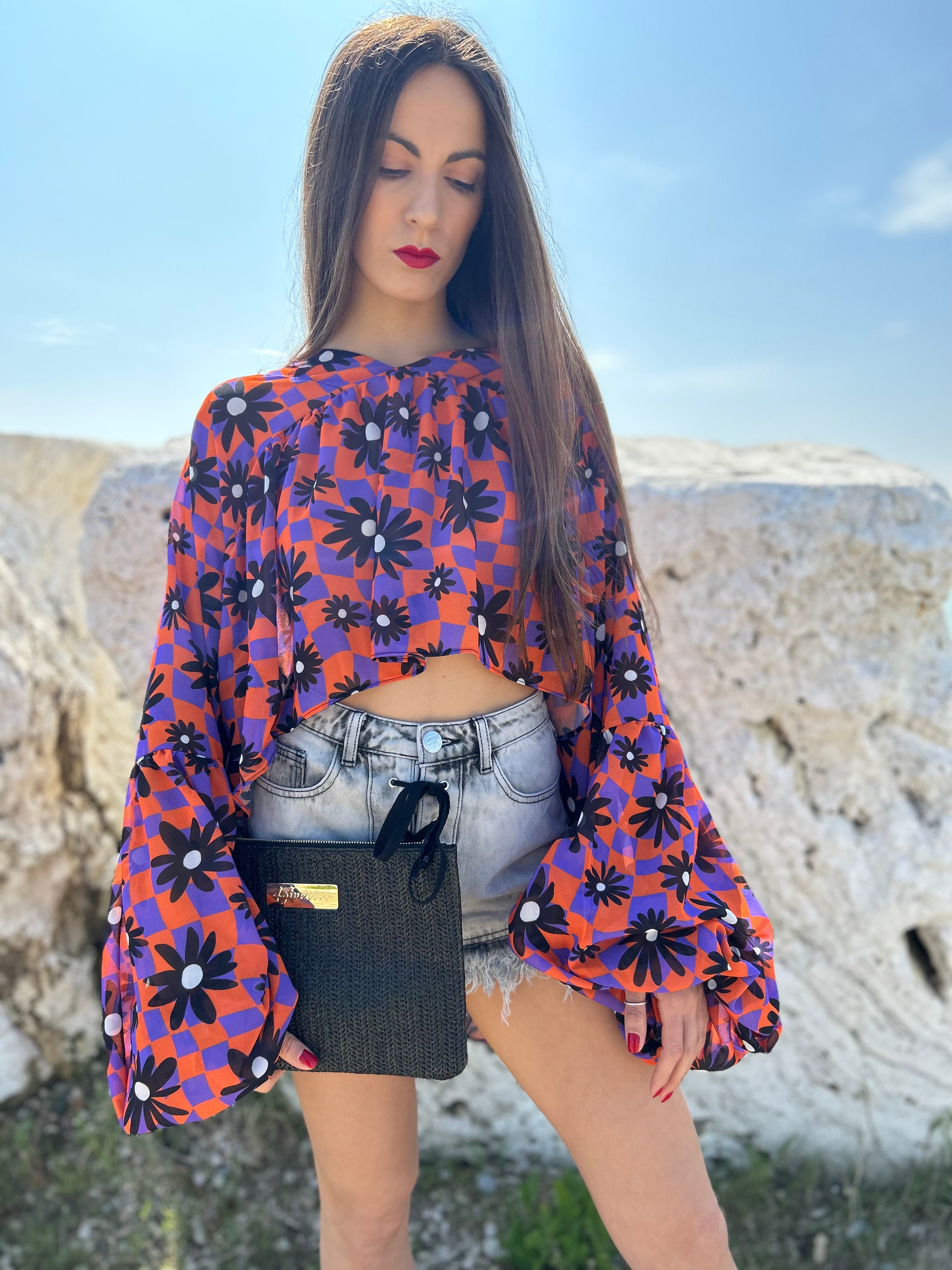 BLUSA CON MARGHERITE