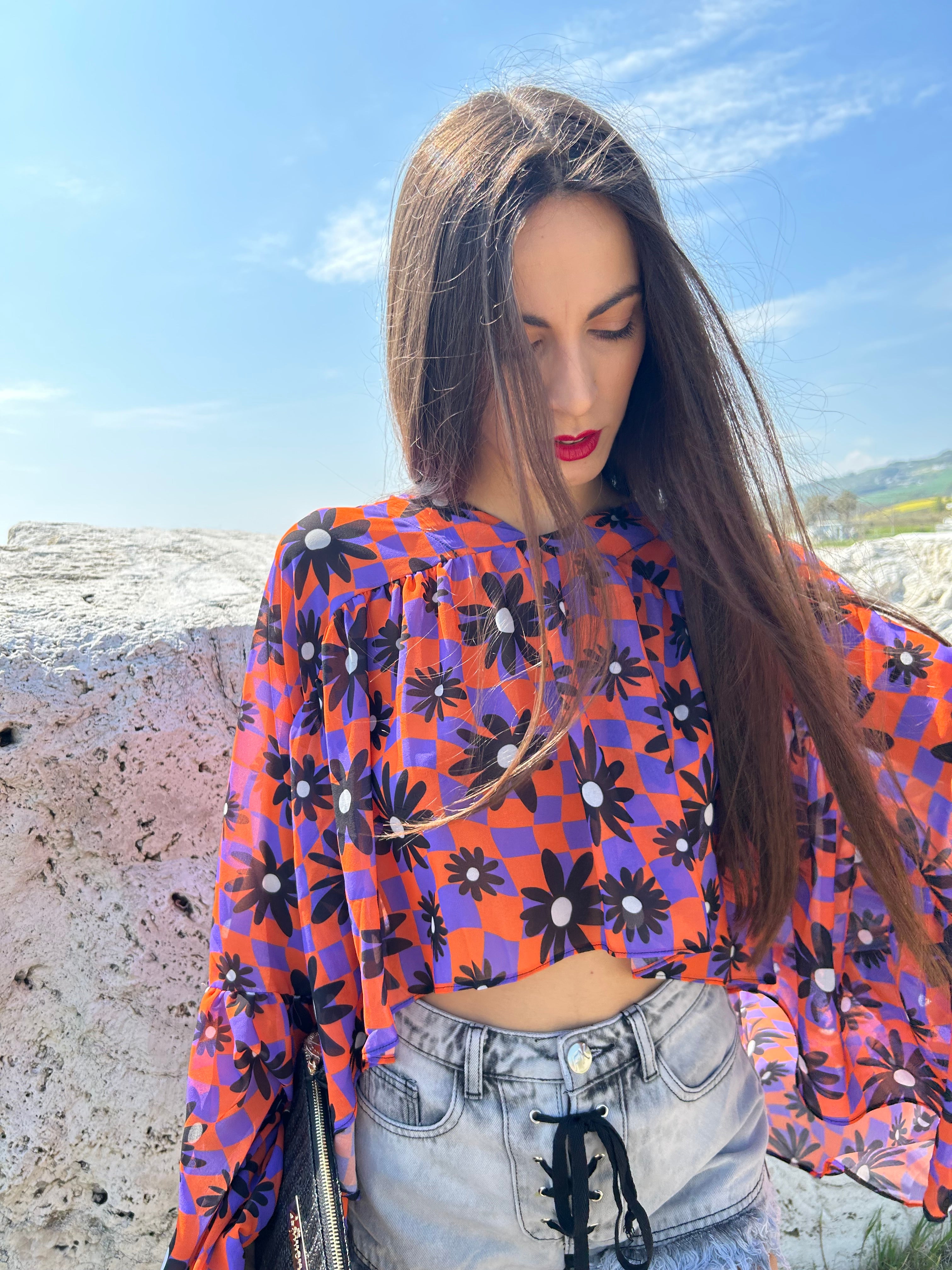 BLUSA CON MARGHERITE